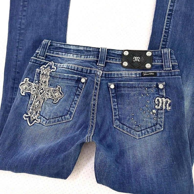 miss me? 2000’s cross embellished standard rise bootcut jeans. flawless grunge ~ tsuyome piece.