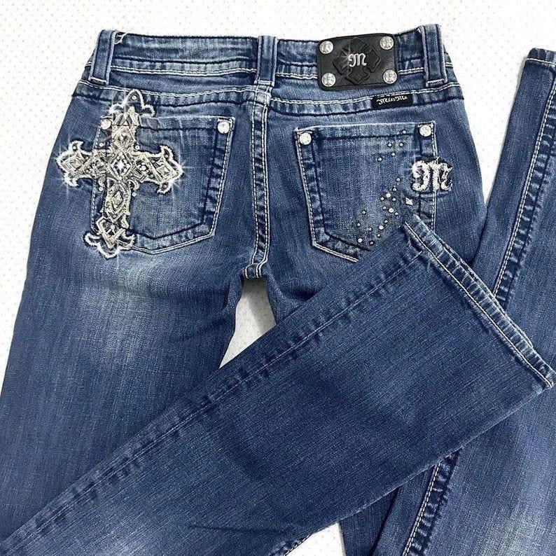 miss me? 2000’s cross embellished standard rise bootcut jeans. flawless grunge ~ tsuyome piece.